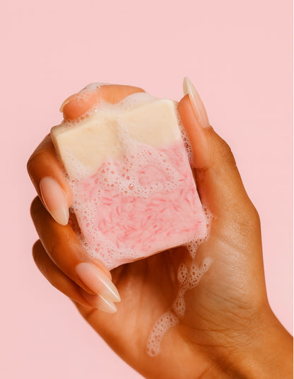 Black Cherry Swirl Soap producing creamy lather during use, showcasing its lathering bubbles